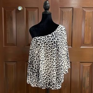 Women’s NWT leopard print off one shoulder flowing top.